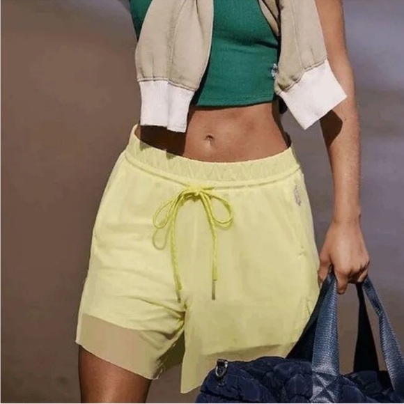 Free People Pants - NWOT Free People Movement Mesh overlay Double Vision yellow Long Shorts size Med